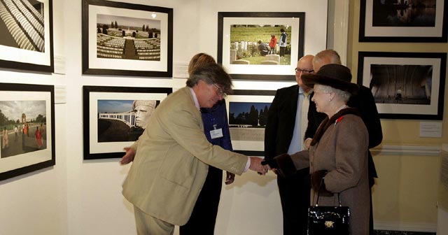 Brian greets the Queen at the CWGC Exhibition opening (AP / Rota)